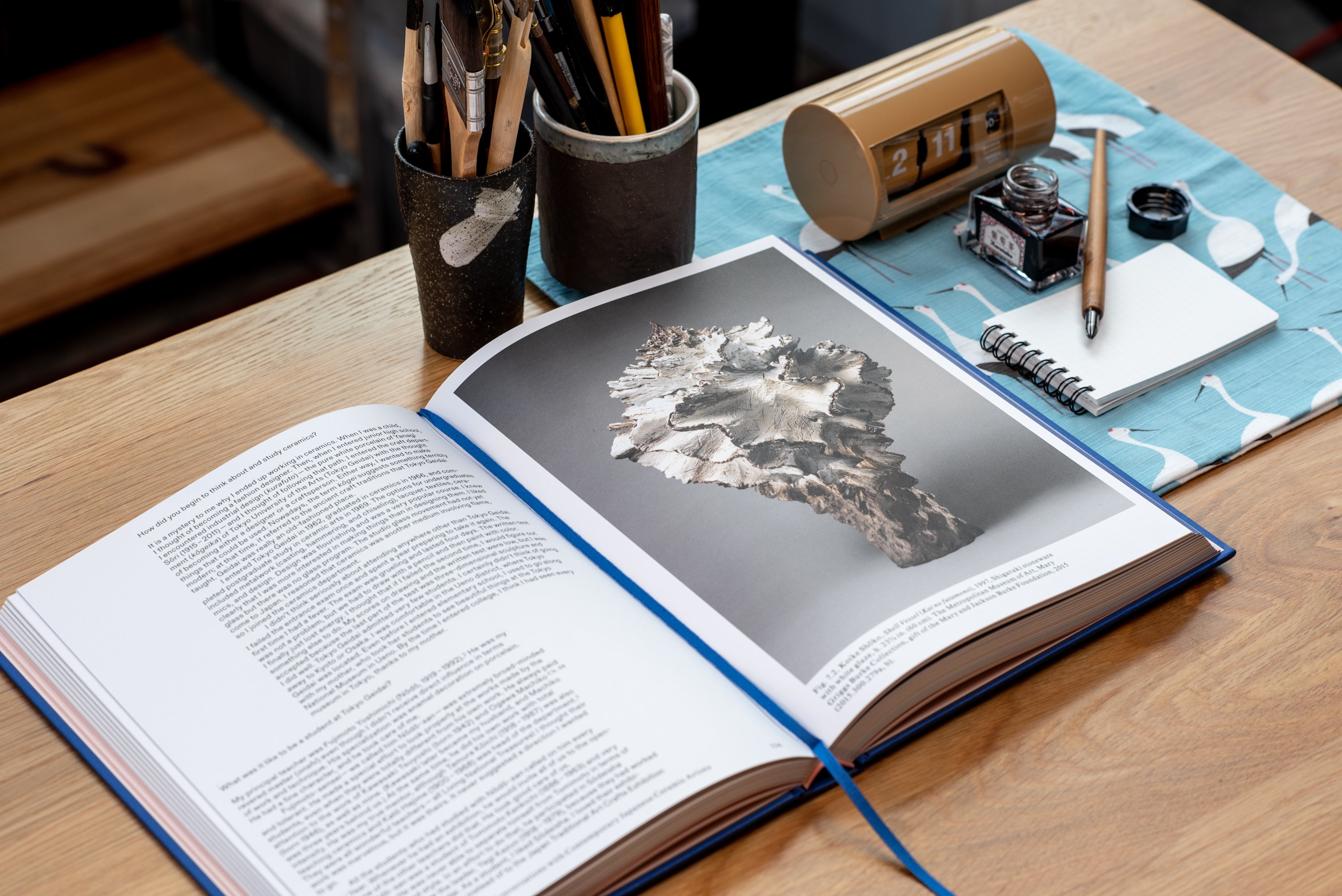 Penguin - Listening to Clay - St. Louis Art Supply