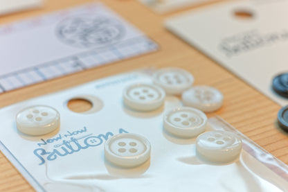 Now Now Buttons, Pearl Buff