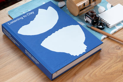 Penguin - Listening to Clay - St. Louis Art Supply